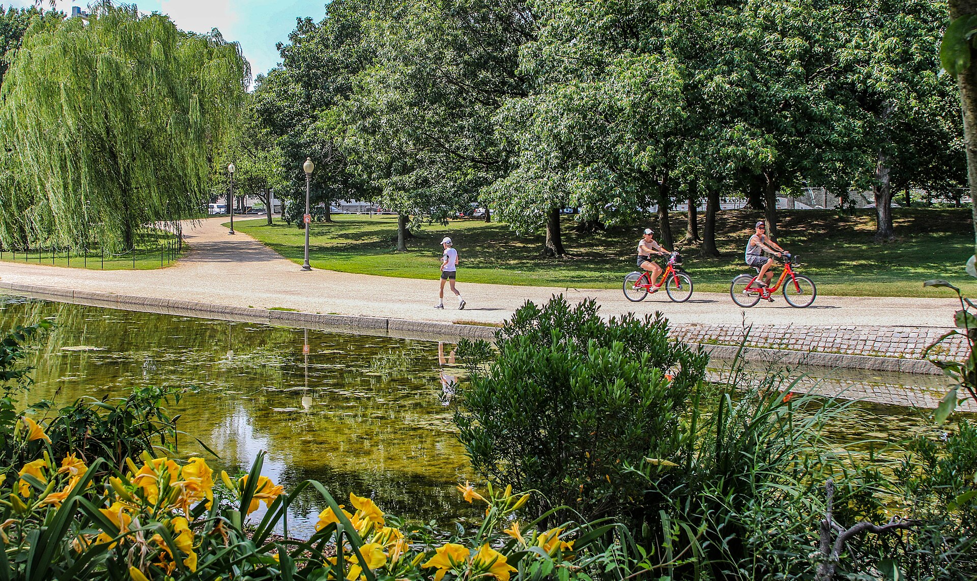 two runners park path
